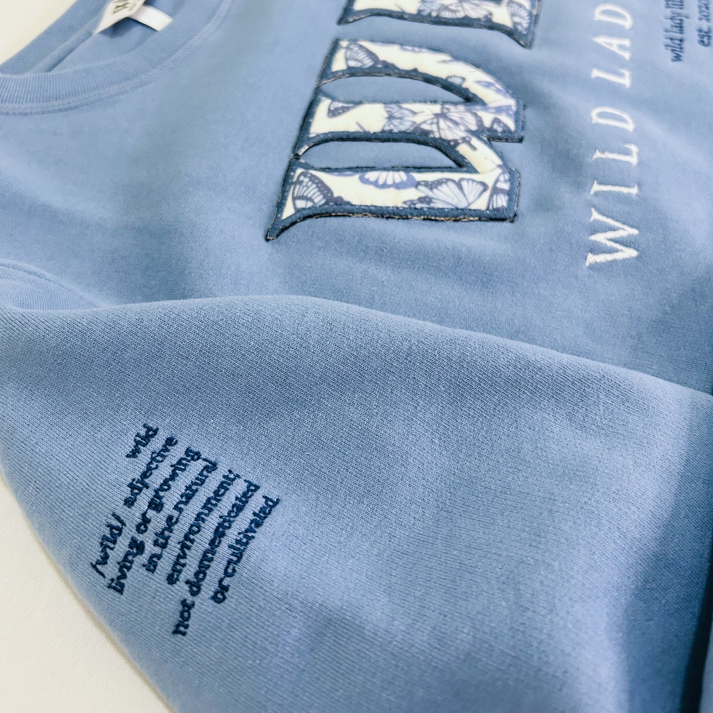 Wild Lady Unisex Sweatshirt in Cloudy Blue