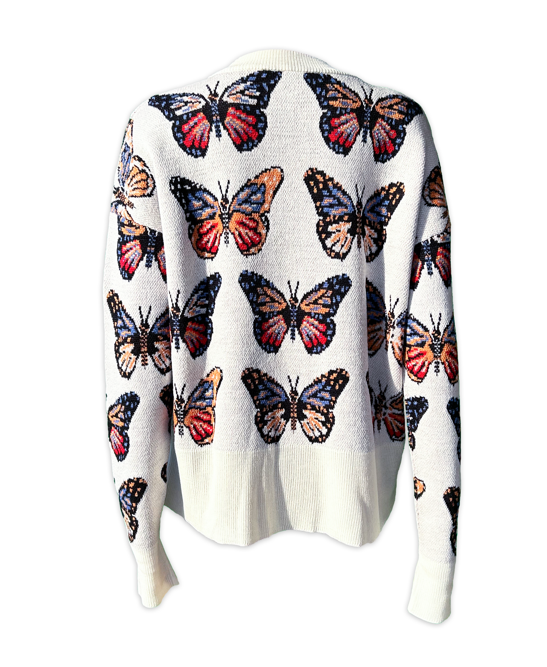Back view of Merino Wool Cardigan in Milky White with butterflies in shades of red, blue, tangerine, and black.  Made in family owned factory in Italy.