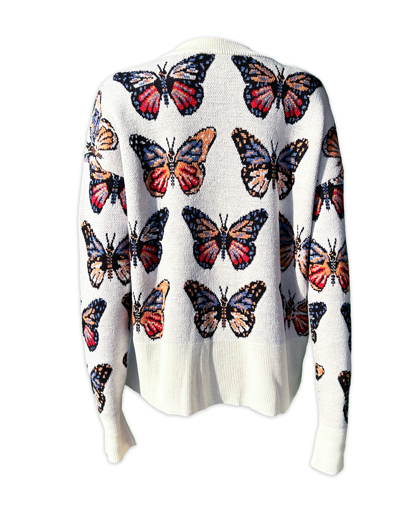 Back view of Merino Wool Cardigan in Milky White with butterflies in shades of red, blue, tangerine, and black.  Made in family owned factory in Italy.